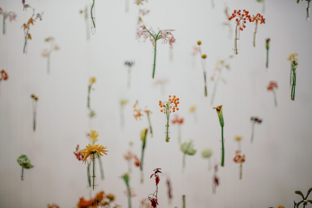 Hanging test tubes of flowers